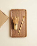 Kit lifestyle: walnut tray with chasen and gold scoop